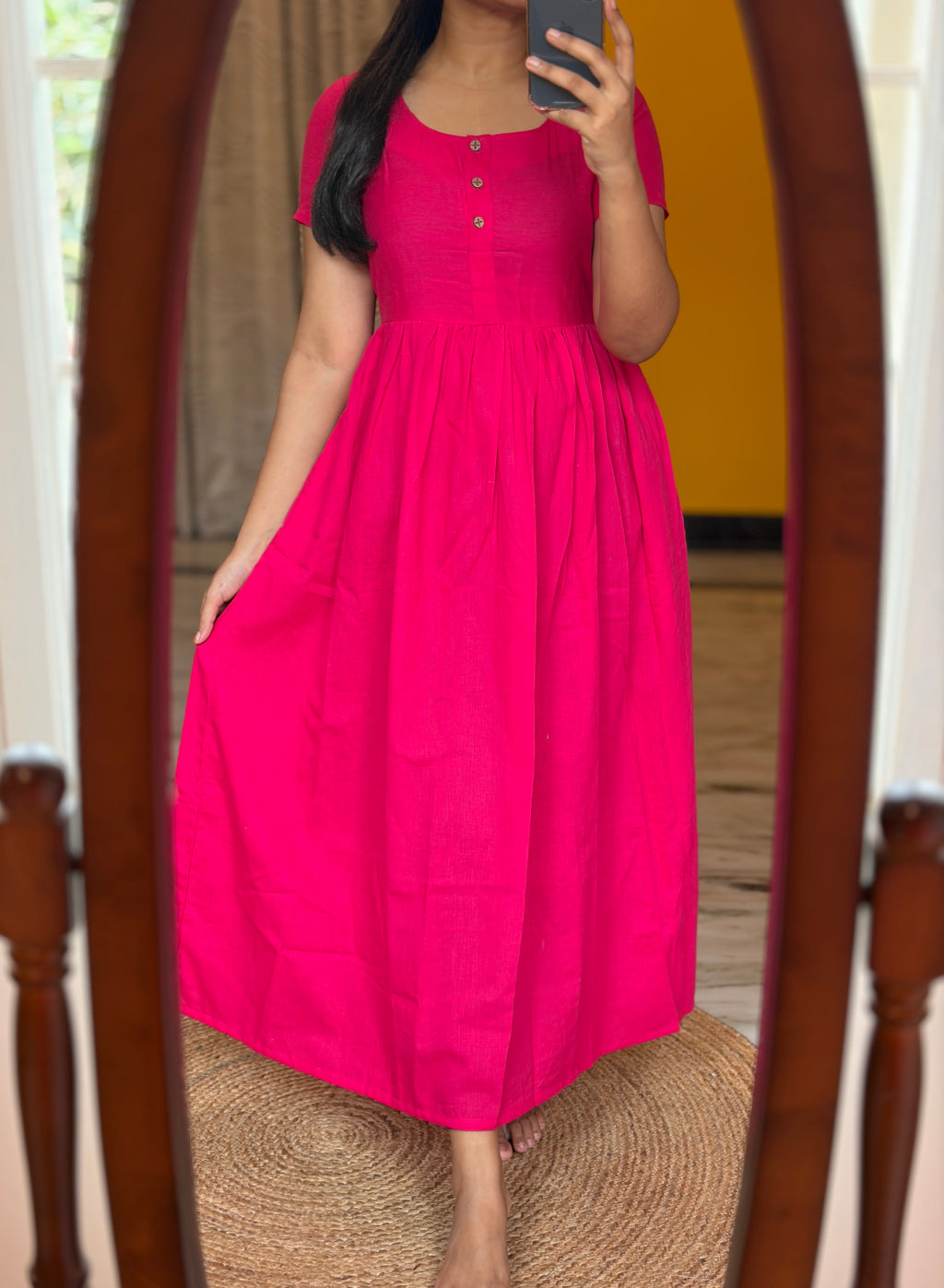 Maxi with openable buttons